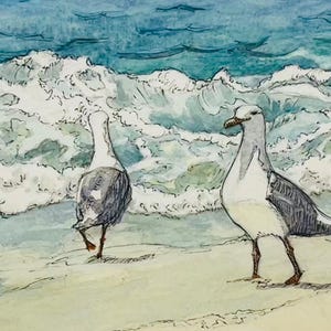 May include: Watercolor painting of two seagulls on a sandy beach with foamy waves in the background. The birds have gray and white feathers and are standing near the water's edge. The artwork has a soft, natural color palette.