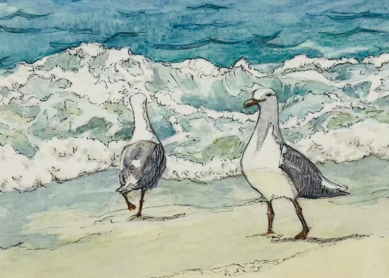 May include: Watercolor painting of two seagulls on a sandy beach with foamy waves in the background. The birds have gray and white feathers and are standing near the water's edge. The artwork has a soft, natural color palette.