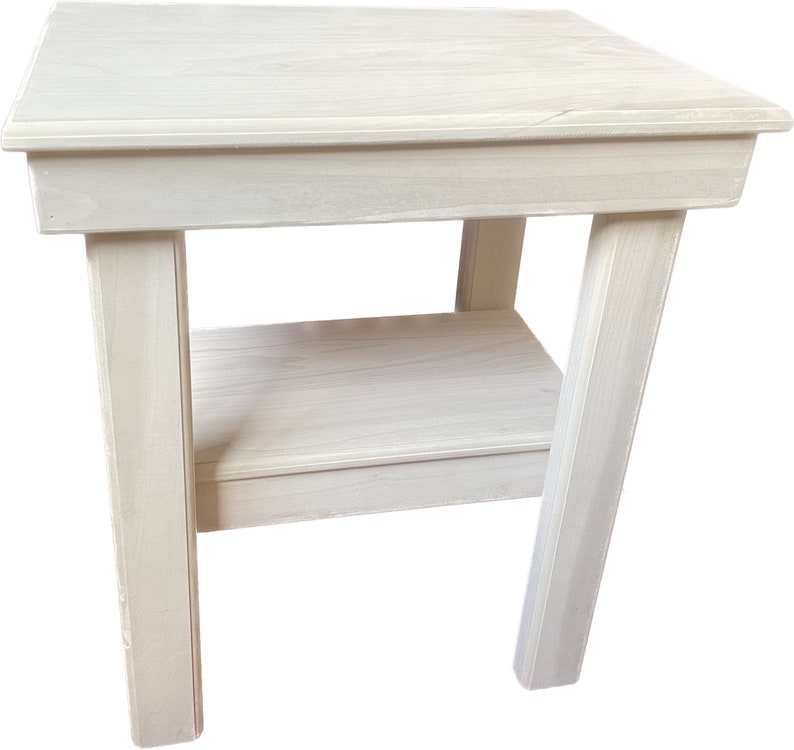 May include: White wooden end table with a single shelf. The table has a simple, farmhouse style.