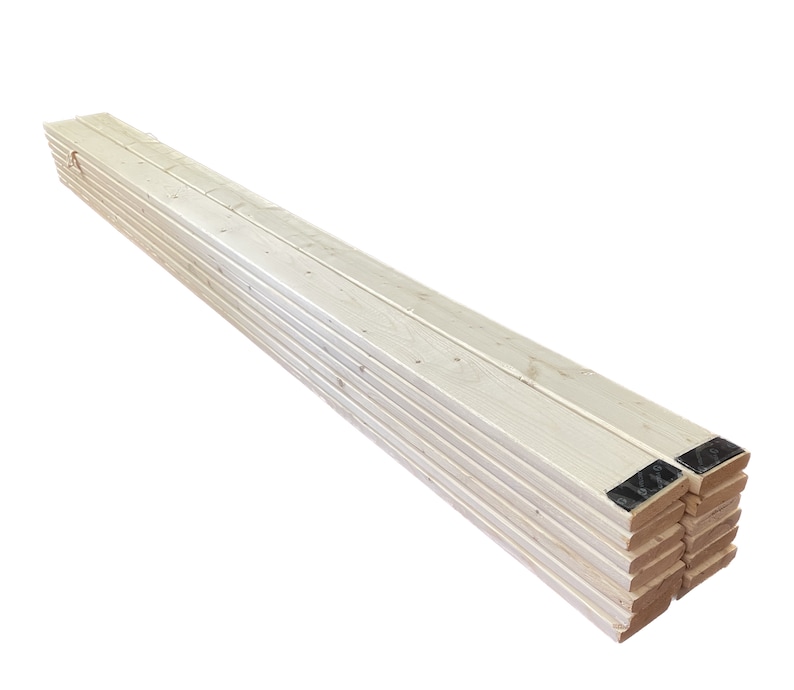 May include: A stack of unfinished, light wood planks with black labels on the ends.