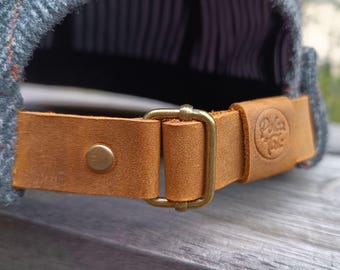 Italiensk ulldockerhatt: Mössa i vintagestil med fodrad bomull och bruna läderdetaljer