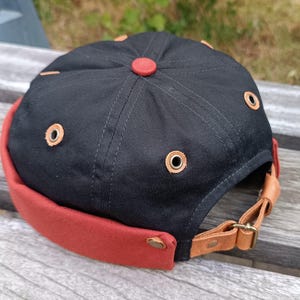 Brimless Docker Hat in Black and Brick Cotton Twill