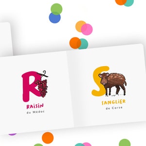 May include: An open book with colourful illustrations of a grape and a wild boar. The letter R is pink and the letter S is yellow. The text reads "Raisin du M&eacute;doc" and "Sanglier de Corse".
