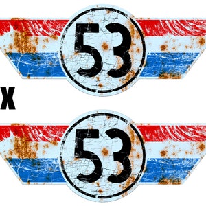 Puede incluir: Dos calcomanías de metal oxidado con un círculo blanco y el número 53 negro en su interior. El círculo está rodeado de rayas rojas, blancas y azules que se asemejan a una bandera. Las calcomanías tienen una forma de ala.