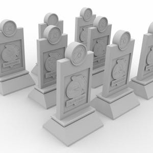 Op de afbeelding: Een set van acht grijze, rechthoekige trofee-plaquettes met een witte vogelafbeelding en de tekst "The Big Winner" op elke plaquette.