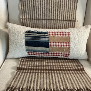 Decoratief sierkussen in Ralph Lauren-stijl, met vlagmotief.