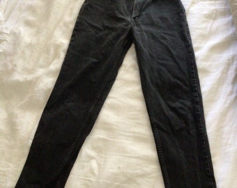 Vintage Levi’s 512 faded black Womens slim fit and tapered legs, vintage clothing