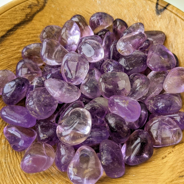 Amethyst tumbled stones; Bulk: 0.25kg; Approx 29 tumble stones.