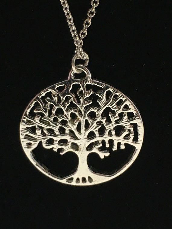 Beautiful stainless necklace with tree pendant