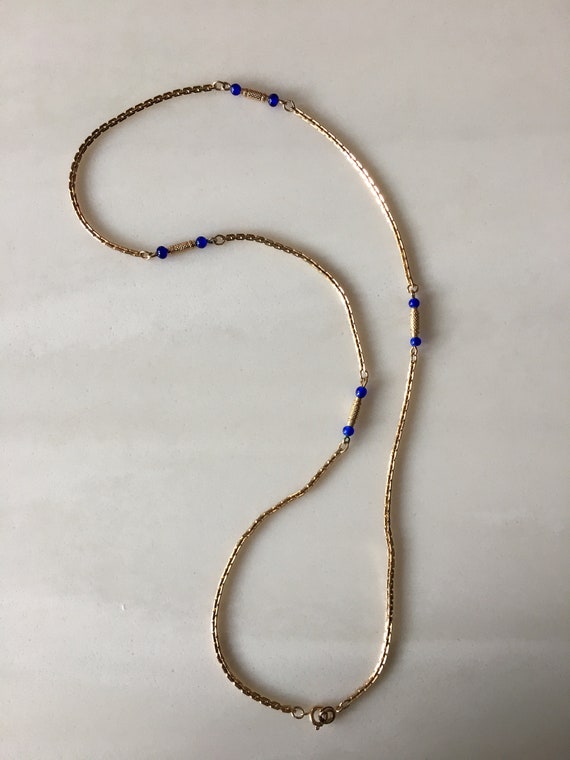 Antique gold chain with blue enameled beads