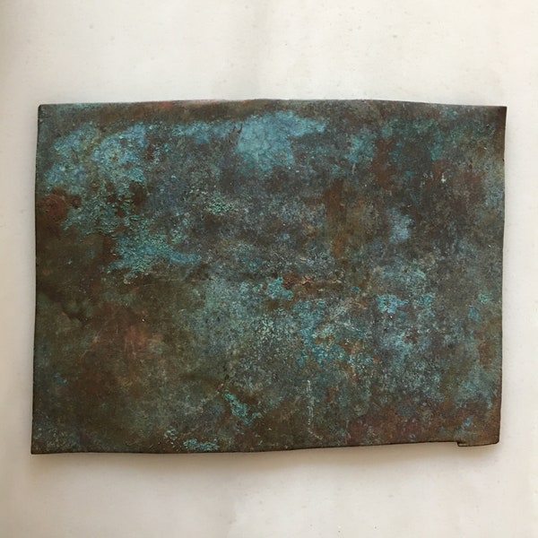 Antique copper sheet with patina from weather for use and crafts