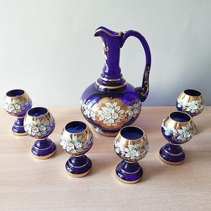Set of liqueur glasses, 6+1, decorated with gold and enamel. Bohemia