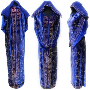 May include: A long blue velvet robe with a hood, featuring a gold and purple geometric pattern. The robe has long sleeves and a zipper closure.