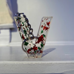 V Red & Green Flakes Resin Keychain - as is