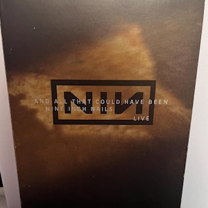 Vintage Metal DVD Disk Nine Inch Nails