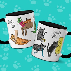 May include: Two white ceramic mugs with black rims feature humorous illustrations of cats in various situations. One mug shows a cat playing with a cord, another cat scratching a couch, and a cat looking at a clock that reads 03:00. The other mug shows a cat playing with a plant, a cat being petted by a hand, and a cat looking at a sign that says "Ollie! No!"