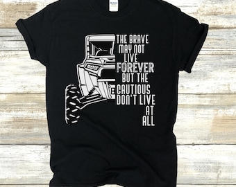 May include: Black t-shirt with a white graphic of an off-road vehicle and the text "The brave may not live forever but the cautious don't live at all."