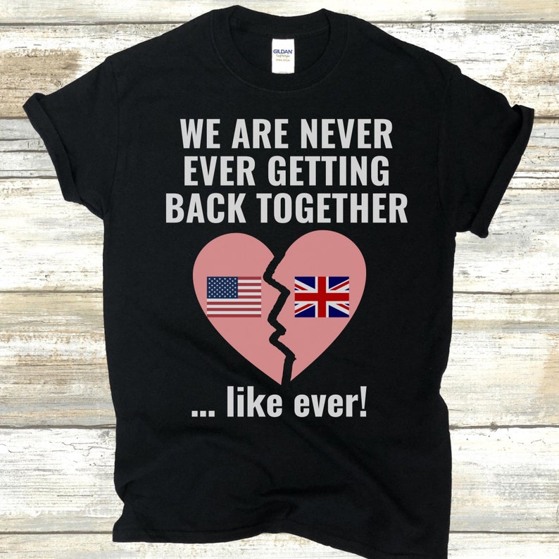 May include: Black t-shirt with a broken heart design featuring the American and British flags. The text reads "We are never ever getting back together... like ever!"