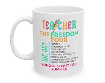 May include: White ceramic coffee mug with a colorful graphic that says "Teacher The Freedom Tour We Out School's Out For Summer".