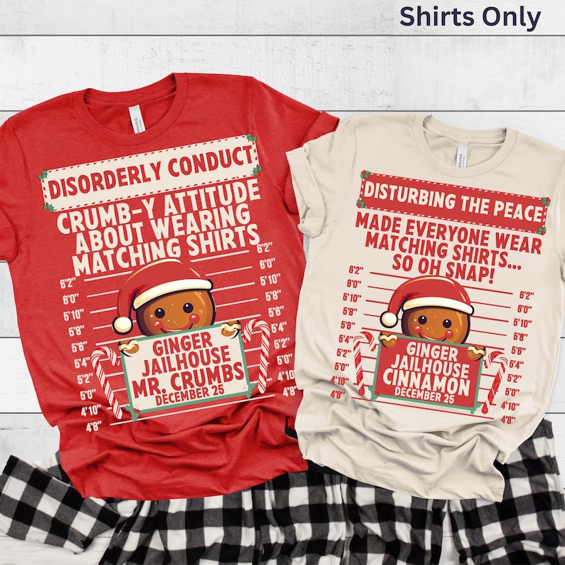 May include: Two Christmas-themed t-shirts, one red and one cream, with humorous text and gingerbread man graphics. The red shirt reads "Disorderly Conduct" and the cream shirt says "Disturbing the Peace". Both shirts have a "Ginger Jailhouse" theme.