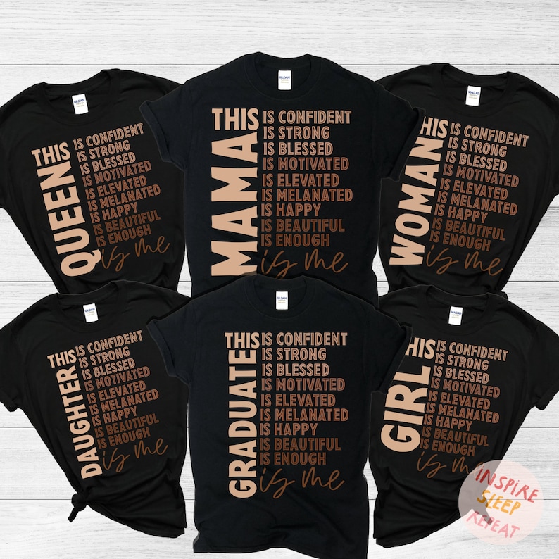 May include: Five black t-shirts with brown text. The text on each shirt reads "This is confident, is strong, is blessed, is motivated, is elevated, is melanated, is happy, is beautiful, is enough" and then the word "Queen", "Mama", "Woman", "Graduate", or "Girl" followed by "is me".
