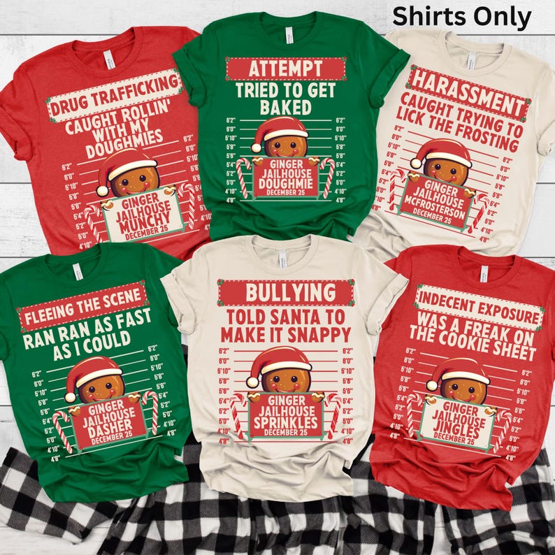 May include: A collection of red, green, and beige t-shirts with humorous Christmas-themed graphics. Each shirt features a gingerbread man in a Santa hat with text like "Drug Trafficking" and "Indecent Exposure".