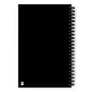 May include: Black spiral bound notebook with a black cover.