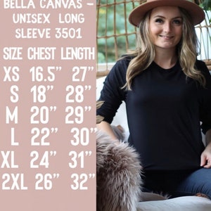 May include: Size chart for a Bella Canvas unisex long sleeve shirt. The chart shows the chest and length measurements in inches for sizes XS, S, M, L, XL, and 2XL.