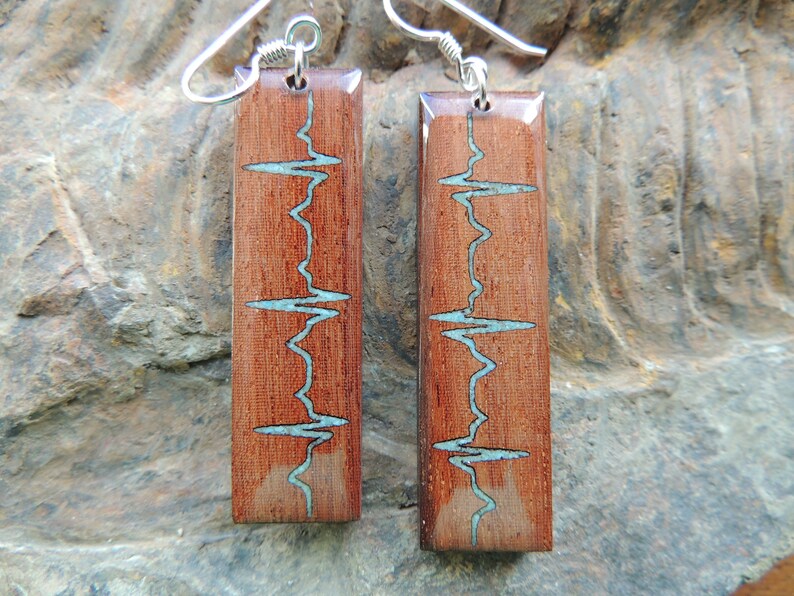NSR inlaid in Turqoise in Mexican Royal Ebony