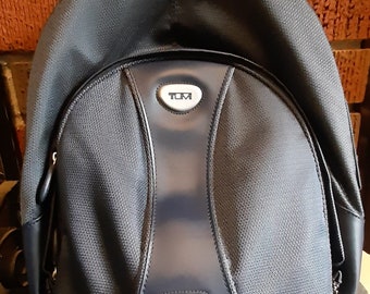 used tumi backpack
