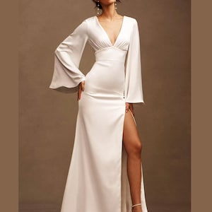 Satin Long-Sleeve V-Neck A-Line Wedding Gown. Bridal backless dress with buttons. Custom Wedding  simple  dress with long flared sleeves .