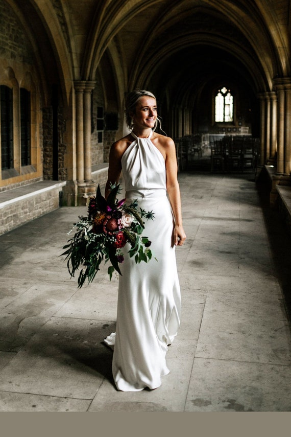 A Line Drape Flower Backless Satin Halter Wedding Dress A Line Drape Flower Backless Satin Halter Wedding Dress