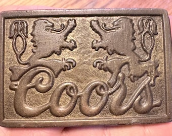 Vintage Coors Beer Belt Buckle – Raised Script Logo with Heraldic Lions – Solid Brass Tone