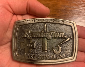 Vintage Remington “40 Years of Progress” Safety Lake City Plant 1984 The Great American Buckle Company Solid Brass Heavy Belt Buckle Rare