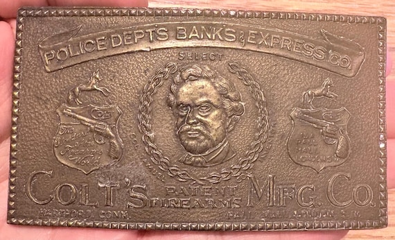 Vintage Colt’s Patent Firearms Belt Buckle – Samuel Colt Portrait – Police Depts., Banks & Express Co. – Solid Brass – Bastian Bros. B-156