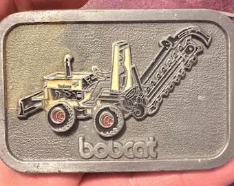 Zabytkowa klamra do paska Bobcat Construction Equipment – wykończenie cynowe – kolekcjonerskie maszyny przemysłowe