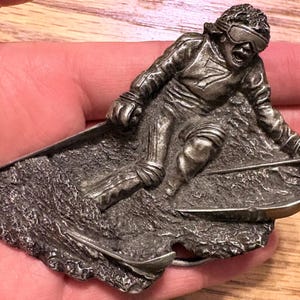 Vintage Bergamot Brass Bode Miller Skier Belt Buckle 1970s Snow Skiing Mountain Sports 3D Figural Textured Pewter Tone Winter Alpine