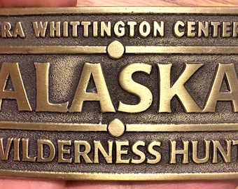 Fibbia per cintura da caccia vintage NRA Whittington Center Alaska Wilderness, per attività all'aperto.