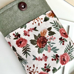 Book pouch for your paperback book. Green canvas with light floral rose print to hold glasses. Green book pouch with  pocket