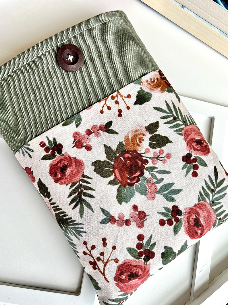 Book pouch for your paperback book. Green canvas with light floral rose print to hold glasses. Green book pouch with  pocket