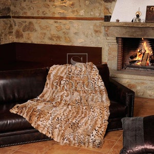 Fur blanket of natural cat lynx fur, with slip-resistant lining.