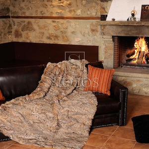 Fur blanket of natural cat lynx fur, with slip-resistant lining.