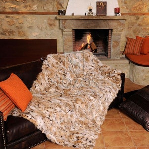 Fur blanket of natural cat lynx fur, with slip-resistant lining.