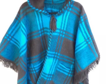 Plaid Patterns Alpaca Cape. Handcrafted by indigenous Hands. Open Cape with pockets. Great for outdoors.