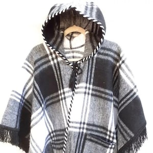 Plaid Patterns Alpaca Cape. Handcrafted by indigenous Hands. Open Cape with pockets. Great for outdoors.