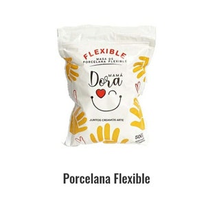 May include: A white plastic bag of Mamá Dora flexible porcelain clay weighing 500g. The packaging features red and black text, a red heart, a black smiling mouth, and yellow hand prints. The text reads Flexible Masa De Porcelana Flexible.