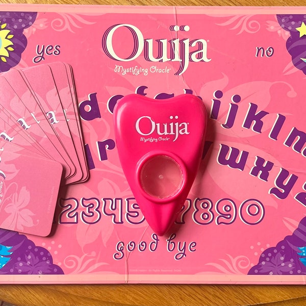 RARE 2008 hasboro pink ouija board- case, cards, and planchette included