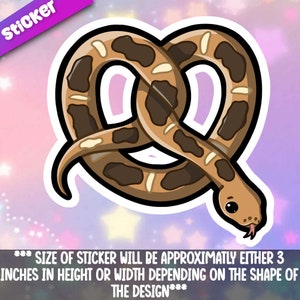May include: A brown and tan snake shaped like a pretzel. The snake has a cute cartoon face with big eyes. The sticker is approximately 3 inches in height or width.