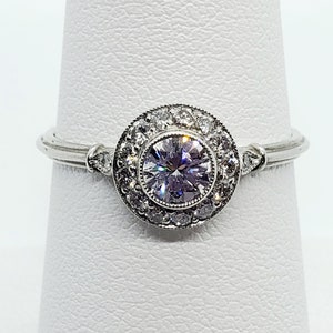 Diamond Halo Ring in Platinum - size 7