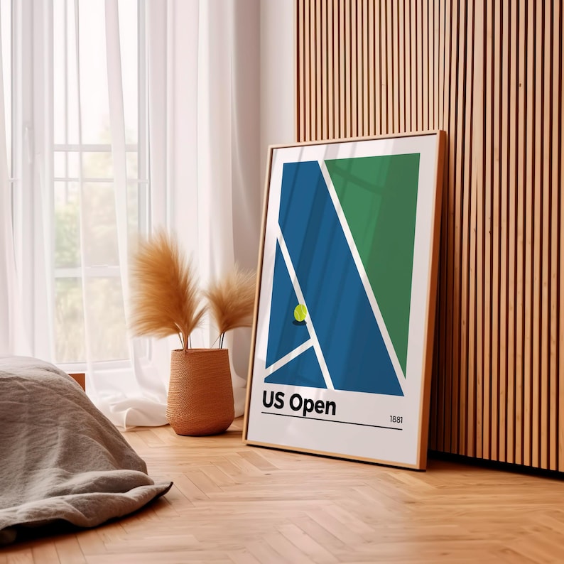 May include: A minimalist poster with a blue, green, and white geometric design representing a tennis court. The poster has the text "US Open" and "1881" printed on it.